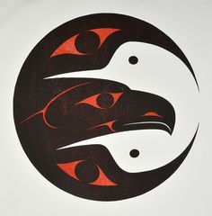 an image of two black and red birds in a circular design on white paper,