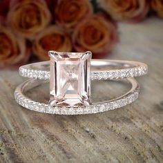 an engagement ring with a pink morganite surrounded by diamonds