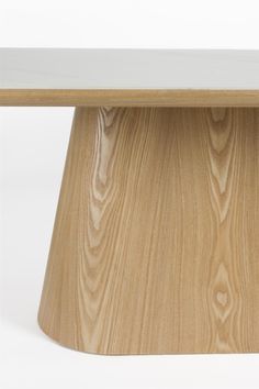 a wooden table with white top and wood grained finish on the base, against a white background