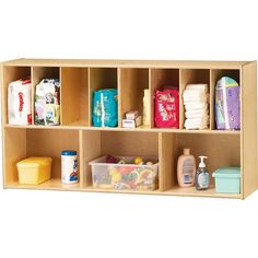 a wooden shelf filled with lots of different items