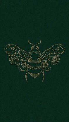 a golden bee on a dark green background