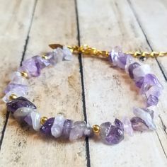 Bracelet Made With Natural Amethyst Gemstone Chip Beads, Golden Spacer Beads, Golden Leaf Charm, Golden 1.5" Extension Chain, And Lobster Clasp Closure. Amethyst Chips Bracelet, Crystal Chip Bracelets, Witchy Products, Gemstone Chips Jewelry, Chip Bead Jewelry, Gemstone Accessories, Gemstone Chips Bracelet, Healing Gemstone Bracelets, Golden Leaf