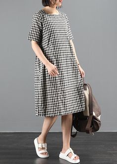 Chic o neck summer clothes Sewing black plaid Dresses

 Materials used:cotton blended

Measurement:One size fits all for this item. Please make sure your size doesn't exceed this size: L/US12-14/EUR42   
   
Shoulder 38cm / 14.82"
bust 100cm / 39"
length 102cm / 39.78"
Armhole 34cm / 13.26"
Sleeve length 26cm / 10.14"



We ship worldwide.

Tracking numbers provided for all orders. Summer Black Plaid Dress, Casual Spring Dress With Grid Pattern, Casual Grid Pattern Dress For Spring, Casual Black Cotton Plaid Dress, Casual Black Plaid Cotton Dress, Black Knee-length Plaid Dress For Summer, Casual Black Plaid Midi Dress, Casual Cotton Plaid Dress With Short Sleeves, Summer Cotton Plaid Midi Dress