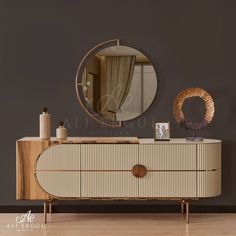 a dresser with a round mirror on top of it