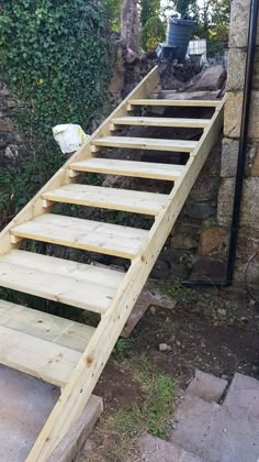 the steps are made out of wood and ready to be built into the house's backyard