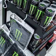 the monster energy drink is on display for sale