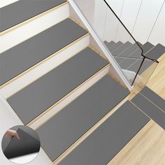 the stair treads are grey and white in color