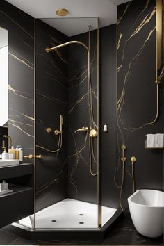 a bathroom with black walls and gold accents