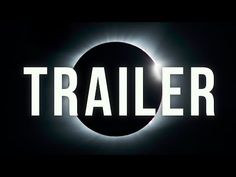 the solar eclipse is seen in front of an advertisement for the movie trailer, which features the sun's corona