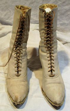 Aren’t these amazing and great? I don’t know much about the history of shoes and I don’t really know how to date these. The boots are a matched pair, and they measure about 9  1/2" high, 9  5/8" from tip of boot to back of heel, and 2  7/8" wide. I could not find any size markings. In fair condition, with lots of wear and scuffs and one significant spot where the leather has worn away on the inside of the right boot above on the heel. FREE shipping within the United States. I’ll gladly combine s Vintage Fitted Boots With Laces, Victorian Boots With Leather Sole And Round Toe, Vintage Fitted Boots With Reinforced Heel, Vintage Leather Boots With Rubber Heel Cap, Vintage Lace-up Boots, Vintage Lace-up Boots With Leather Sole, Vintage Closed Toe Boots With Rubber Heel Cap, Victorian Leather Boots With Round Toe, Antique Leather Sole Boots With Round Toe