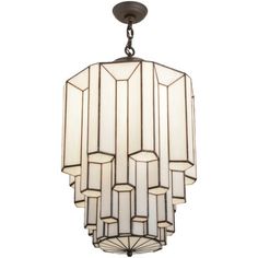 an art deco chandelier with white glass and black metal frame, hanging from the ceiling