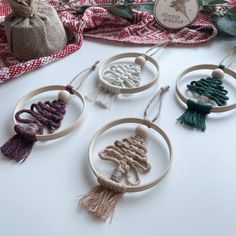 several wooden ornaments are displayed on a table