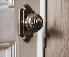 a door handle on a wooden door