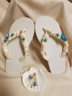 "Very beautiful Flat wedding sandals flipflop style 1/2\" heel. With beautiful workmanship, I used real shells, glass pearls, crystals, beads, pearl star fishes, and ceramic star fishes, plus more. Very dressy and simple please look at the pictures. Sizes: Small: 5.5 - 6.5 Medium: 7-8 Large: 8.5 - 9.5, X-Large: 10 - 11 Children sizes available upon request, please contact for details. Please contact for any questions ON SIZING, or ANY other concerns. FINAL SALE, NO RETURNS, NO EXCHANGES, NO EXCE Adjustable Open Toe Flip Flops For Beach Wedding, Flat Sandals Wedding, Bridal Flip Flops, Rustic Beach Wedding, Ceramic Star, Beach Wedding Sandals, Daytime Wedding, Crystals Beads, Star Fish