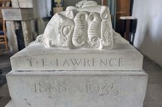 a stone monument with the words t e lawrence on it