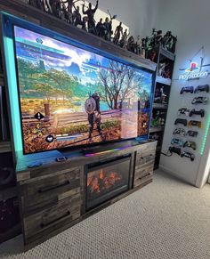 an entertainment center with a large flat screen tv on it's side in a store