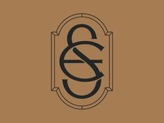 the letter g and s is inscribed in black on a brown background with an oval frame