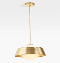 a brass colored light fixture hanging from the ceiling