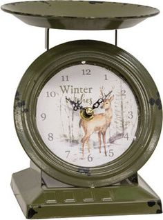 a clock that has a deer on it