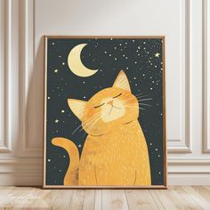 an orange cat with its eyes closed sitting in front of a painting on the wall