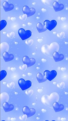 blue and white hearts floating in the air