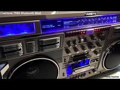 an old fashioned radio with blue lights on it