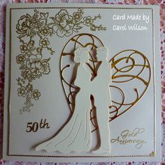 a card made by carol wilson with the silhouette of a bride and groom