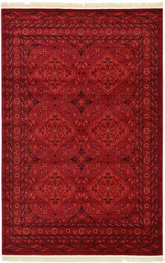 a red rug with an intricate design on the center and bottom, surrounded by small black dots