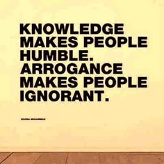 there is a man standing in front of a white wall with words on it that say, knowledge makes people humble arrogance makes people important