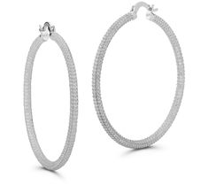 Don't jump through hoops trying to find the perfect earrings because they're right here! These sparkly hoops finish any look with sophisticated glamour. From Sterlina Silver. Sterling Silver Hoop Earrings With Pave Setting, Sparkling Sterling Silver Hoop Earrings, Nickel-free Dangle Hoop Earrings In Alloy, Pave Hoop Earrings, Luxury Sterling Silver Round-cut Hoop Earrings, Silver-plated Cubic Zirconia Hoop Earrings, Sterling Earrings, Hoop Earrings, Jewelry Earrings