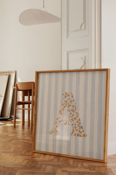 a wooden frame sitting on top of a hard wood floor