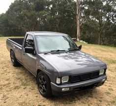 a truck parked in the middle of a field