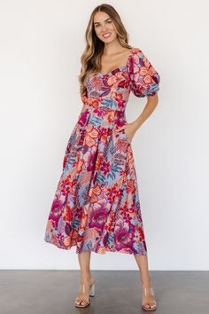 This versatile floral midi dress is the perfect choice to keep you looking stylish and feeling comfortable all day long. Light blue base with vibrant orange and pink flowers throughout Mid-weight material Sweetheart neckline Short bubble sleeves with elastic sleeve cuffs Waist panel Hidden side pockets Smocked back panel Lined on bodice, skirt is not lined Self and lining: 100% Polyester Casey is 5'8, cup size 32B, size 2 and wearing size S Orange And Pink Flowers, Midi Dress Blue, Baltic Born, Long Light, Orange And Pink, Blue Midi Dress, Vibrant Orange, Cup Size, Floral Midi Dress