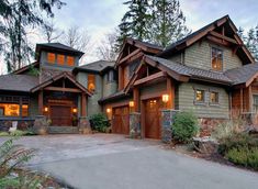 a large house with lots of windows and wood trim