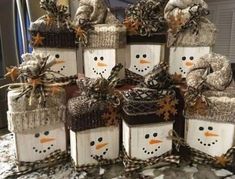 snowmen are wrapped in burlap and tied with twine, ribbons and bows