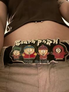 the back of a person's stomach with some cartoon characters on it