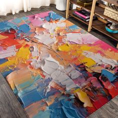 a colorful area rug is on the floor