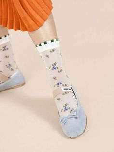 Spring is the thing no matter what time of year it is! channel our favorite season even in fall or winter when you slip on this pair of sheerly delightful floral crew socks.    part of our made in japan series this top-notch pair has a super high needle count for detailing and a hand-closed toe for extra comfort.    nylon  made in japan Name A Better Duo, Alpaca Cardigan, Clog Boots, A Perfect Circle, Favorite Season, Basel, Shoes Booties, The Thing, Leather Gloves