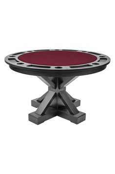 a black and red poker table with an iron base on the top, in front of a white background