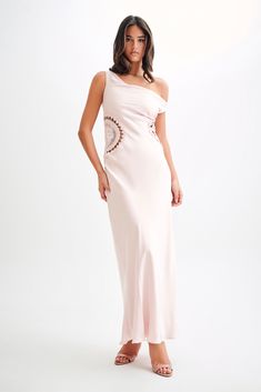 Satin serenity.Step into Satin Serenity with the KRISTINA Maxi Dress With Crochet, a perfect blend of sophistication and relaxed charm. Crafted from luxurious satin, it features cowl necklines at the front and back, offering a graceful silhouette from every angle. Delicate crochet detailing at the side waist adds intricate charm, enhancing the dress's allure. Designed for comfort with a relaxed fit, it includes a side zip, hoop & eye closure for easy wear. This maxi-length dress is ideal for formal occasions or evening events and combines timeless style with contemporary ease. This style is designed to be a relaxed fit, please size down for a more fitted look. Capsule Wardrobe Accessories, Delicate Crochet, European Summer Outfits, Capsule Outfits, Beige Dresses, Satin Maxi, Satin Maxi Dress, Crepe Dress, Linen Dresses