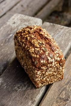 a loaf of bread sitting on top of a wooden table