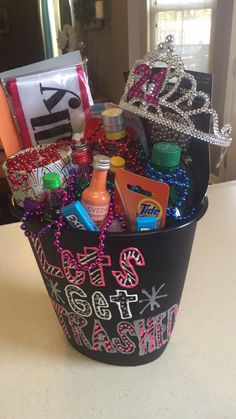 a black bucket filled with lots of different items