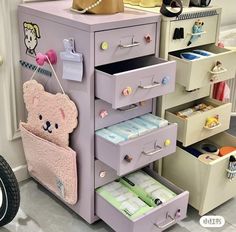 the drawers are organized and ready to be used for baby's nursery items,