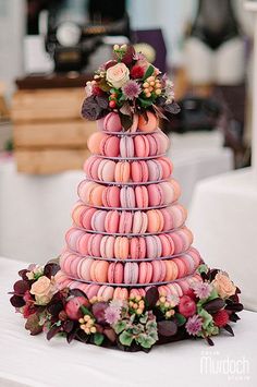 a cake made out of macaroons and flowers