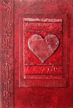 a red book with a heart on it