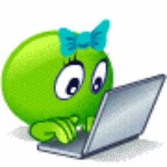 a green cartoon character sitting in front of a laptop with a blue bow on its head