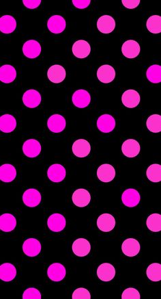 a black background with pink polka dots