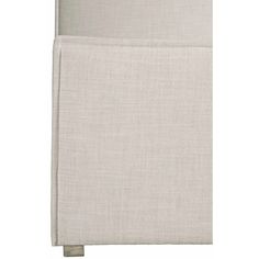 an upholstered headboard made from linen