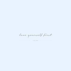 the words love yourself first are written in cursive writing on a light blue background