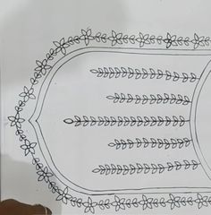 an image of a drawing on the side of a white board with black and white lines